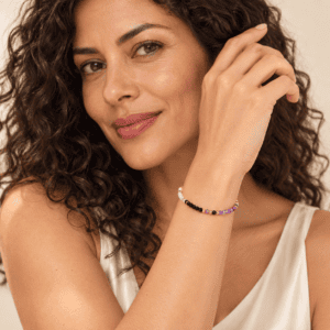 Pulsera multipiedra multicolor en acero dorado